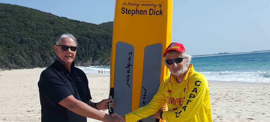 A surf rescue board donated by Warners Bay High School in loving memory of Stephen Dick