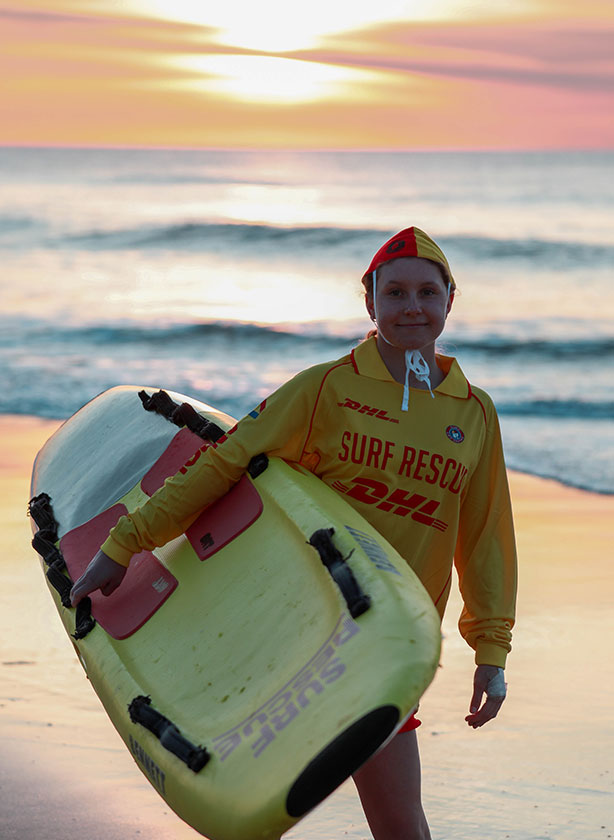 Surf lifesaver at sunrise