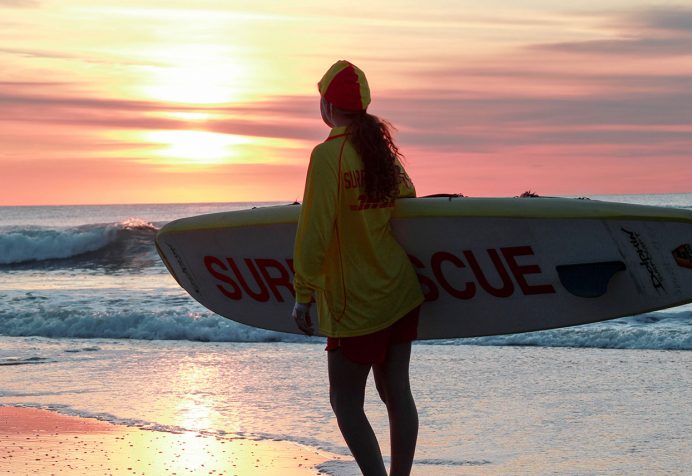 Lifesaver on the beach at sunrise