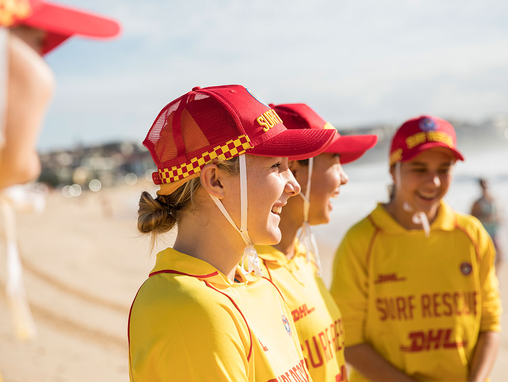 Lifesavers talking on the beach