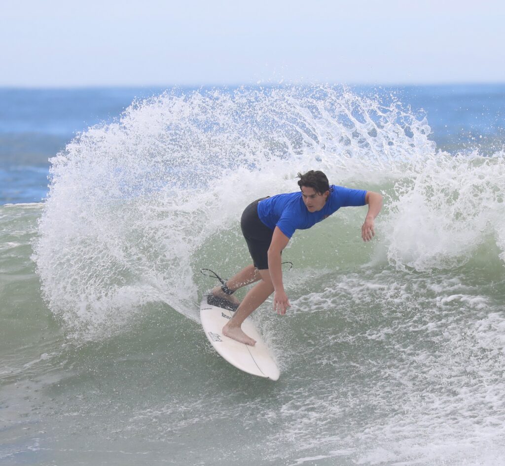 Competitor on wave during Board Riding Championships